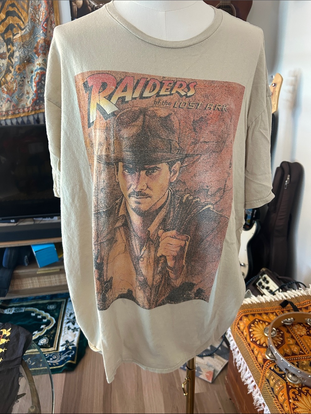 Raiders Graphic Tee - Beige Vintage Movie Poster Design